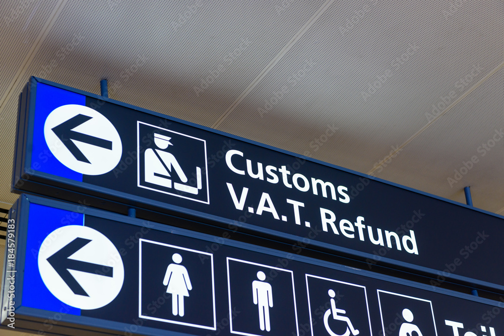 Sign for customs and VAT Refund office in a European Airport. Stock Photo Adobe Stock