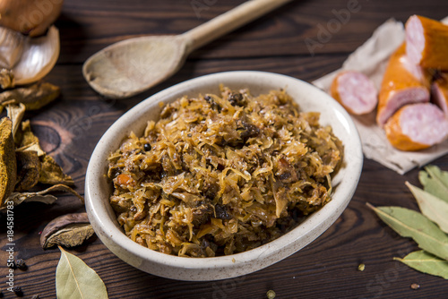 Cabbage stew with meat, mushrooms and dried plums - traditional polish dish