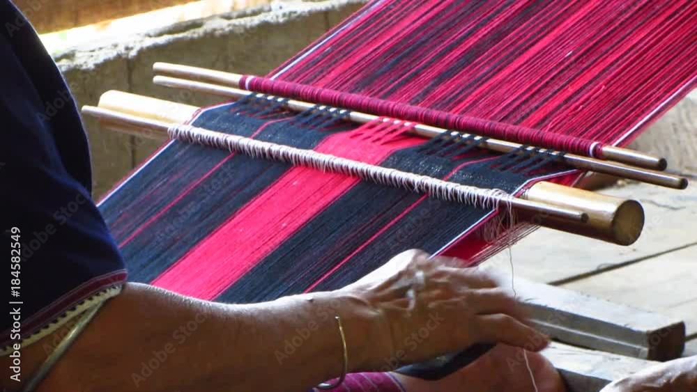 Tribal Woman Weaving a Scarf