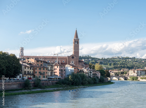 View of Verona. Ponte Pietra, once known as the Pons Marmoreus. It is the Roman arch bridge crossing Adige River © moomusician