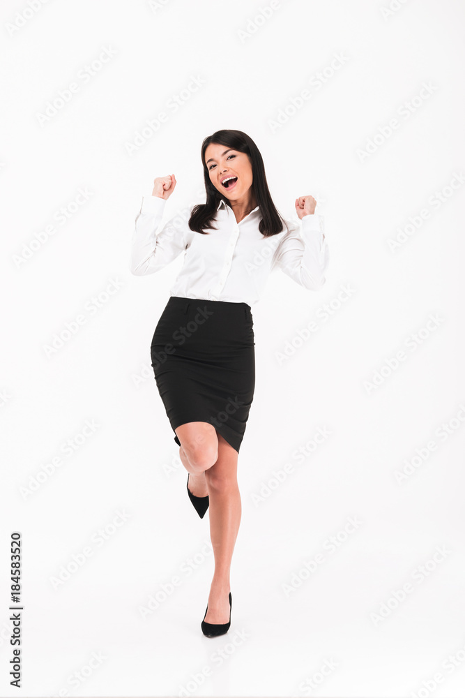Full length portrait of a cheerful asian businesswoman Full length portrait of a cheerful asian businesswoman