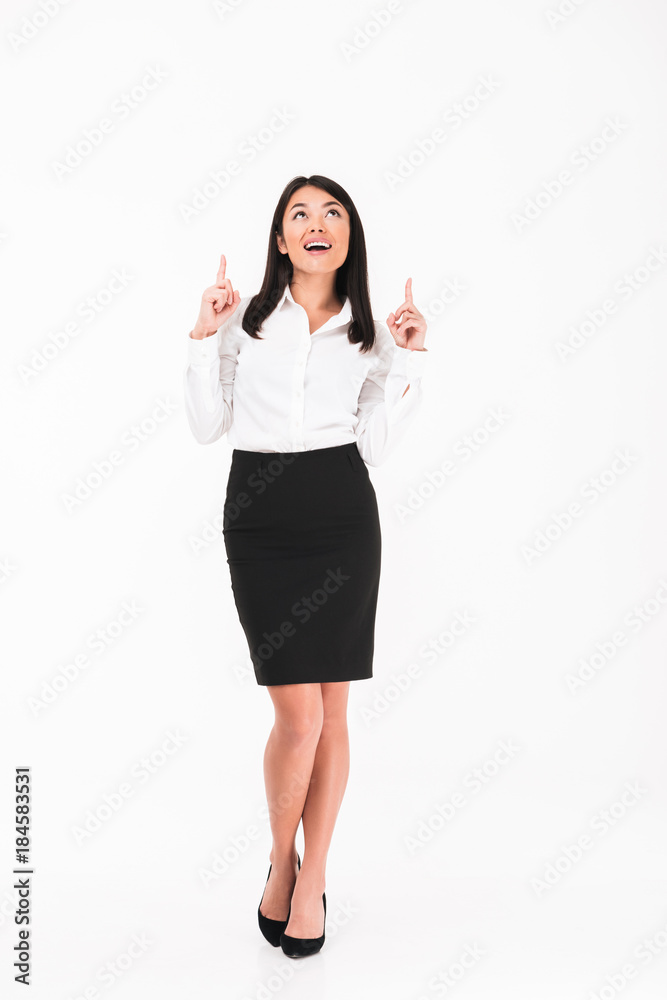 Full length portrait of a joyful asian businesswoman Full length portrait of a joyful asian businesswoman