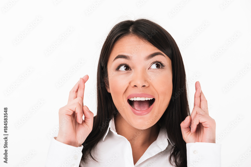 Close up portrait of an excited asian businesswoman