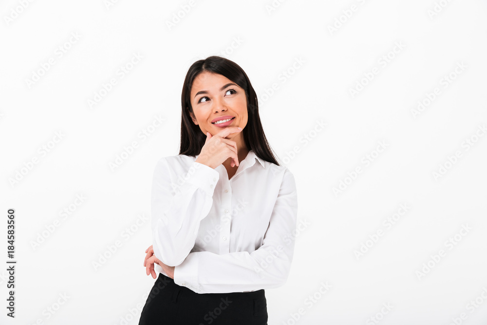 Portrait of a smiling asian businesswoman thinking Portrait of a smiling asian businesswoman thinking