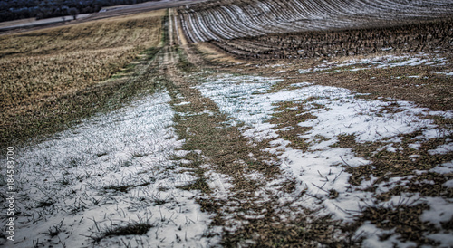 Close up of the lines and textures of a winter field in the midwest