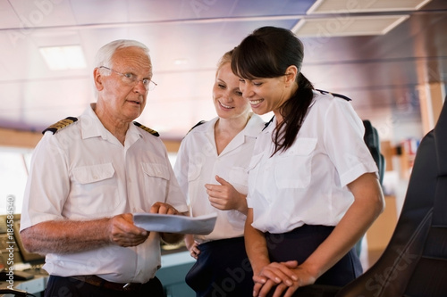 Captain giving advices to his assistants
