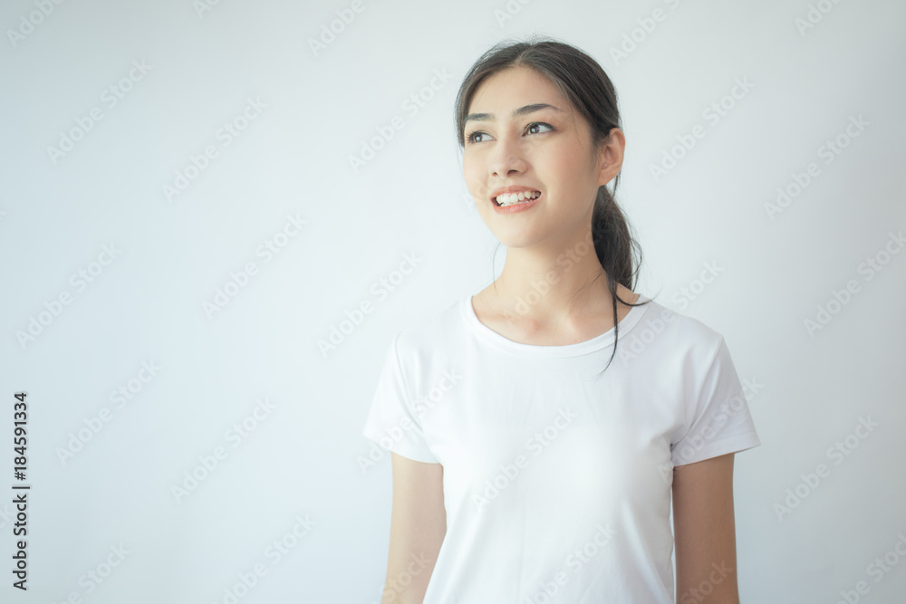 Portrait of Attractive Asian Woman smiling on white background. Portrait of Attractive Asian Woman smiling on white background.