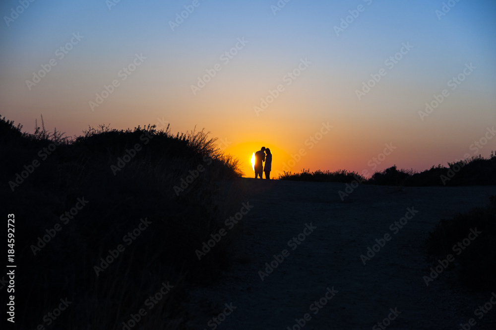 Couple and sunrise, Crete, Greece