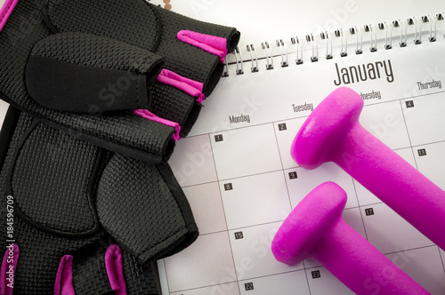 Εκτύπωση καμβά New year resolution and the desire to get in shape concept with a calendar with