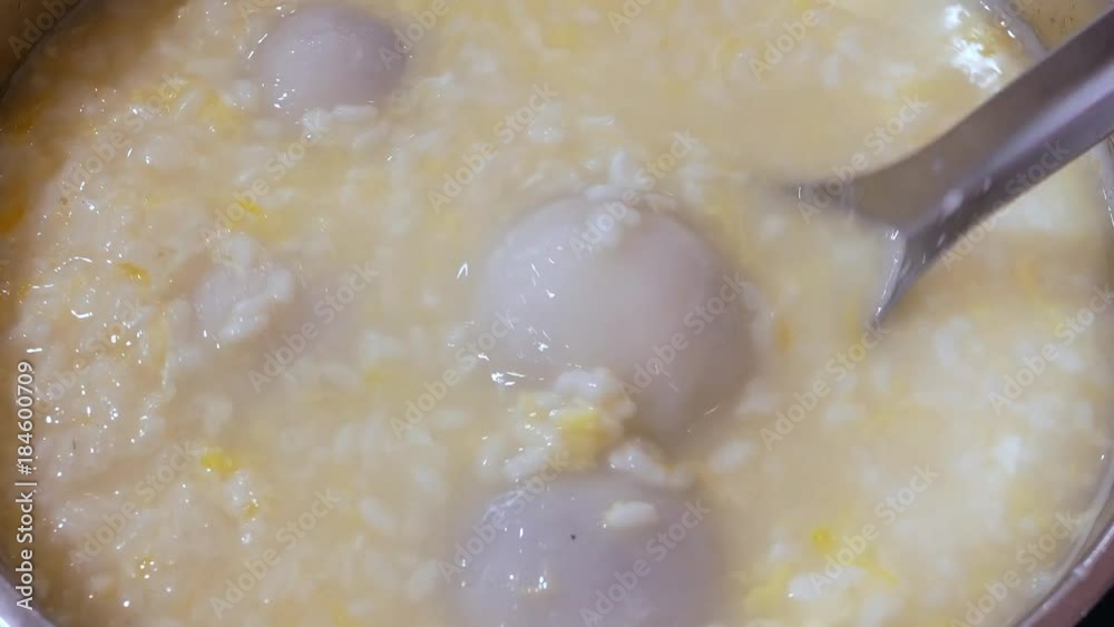 Top shot of people eating sesame rice balls at food court area with 4k resolution. Top shot of people eating sesame rice balls at food court area with 4k resolution.