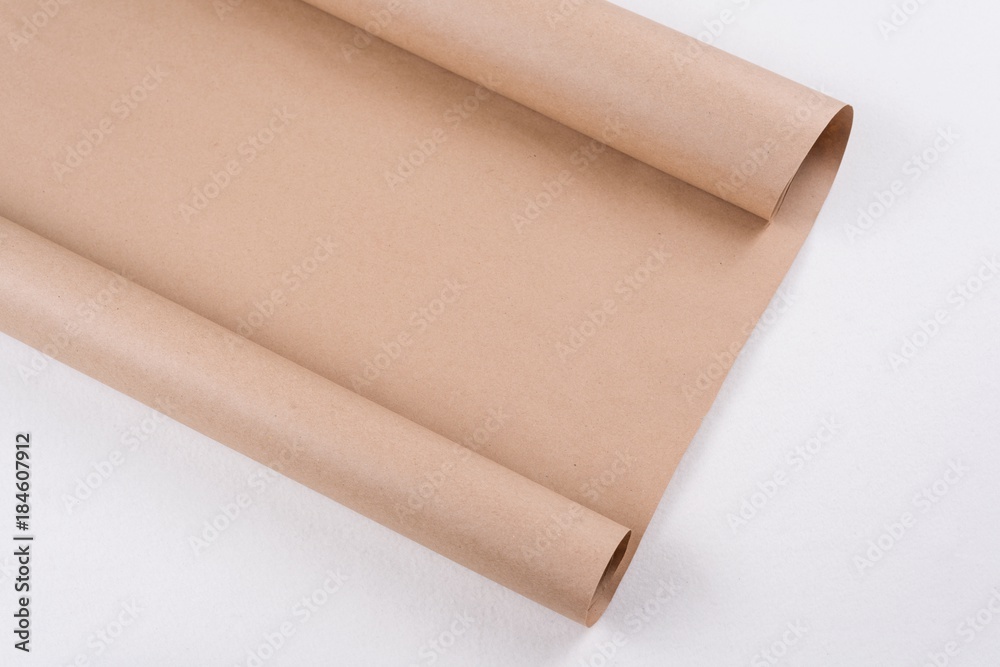 Kraft paper on roll. Background, texture, copy space Kraft paper on roll. Background, texture, copy space