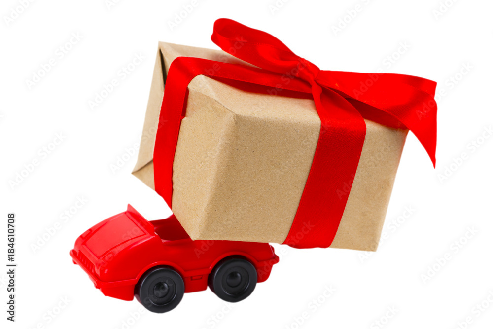  Red toy car delivering gifts box on a white background
