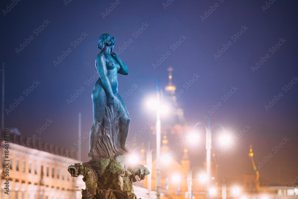 Fototapeta premium Helsinki, Finland. Night View Of Fountain Havis Amanda Is Nude Female Statue Sculpted By Ville Vallgren. Statue Symbolize Rebirth