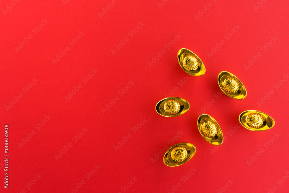 Chinese New Year Background - Golden Ingots with Chinese Character Happiness and Prosperity on Red Background. Chinese New Year Background - Golden Ingots with Chinese Character Happiness and Prosperity on Red Background.
