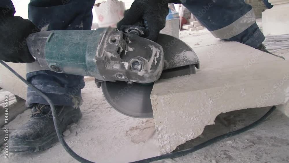 Cutting stone with a saw. Work tool. Close-up. Statics. The camera is not moving.