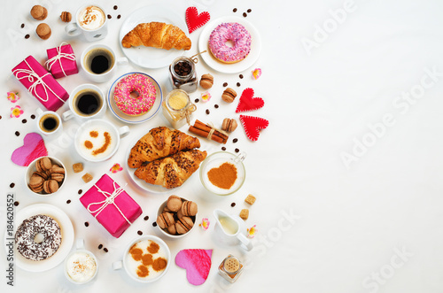 White background with cups of coffee, donuts, gift and hearts