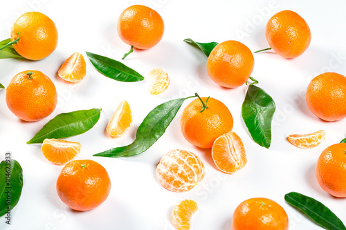 Ripe Orange Tangerine (Mandarin) With Leaves Close-up On The White Background.