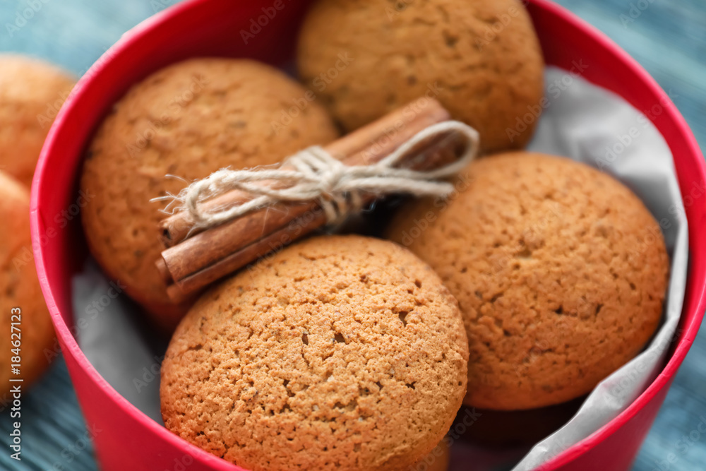 Box with delicious oatmeal cookies, closeup Box with delicious oatmeal cookies, closeup