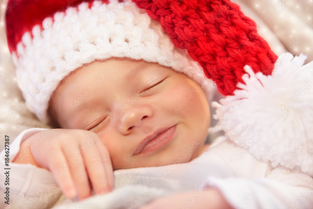 Cute baby Santa smiling in the sleep Cute baby Santa smiling in the sleep