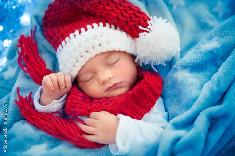 Newborn baby sleeping on Christmas eve Newborn baby sleeping on Christmas eve