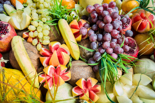 Fototapeta Naklejka Na Ścianę i Meble -  fresh mixed fruits; fruits background healthy eating dieting love