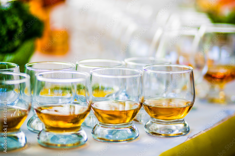 .Glasses of cognac stand on the table