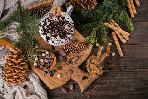 Christmas or New Year composition with hot chocolate or cocoa drink with whipped cream