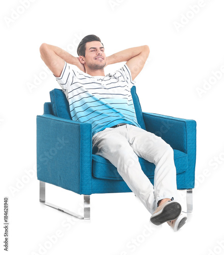 Handsome young man sitting ...