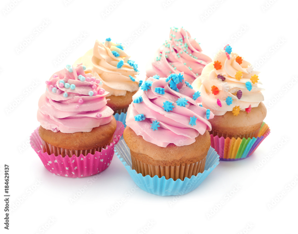 Tasty cupcakes on white background