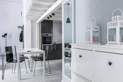 Lanterns on white cabinet