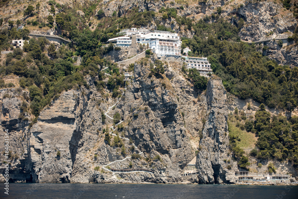 Exclusive villas and hotels on the rocky coast of Amalfi. Campania. Italy