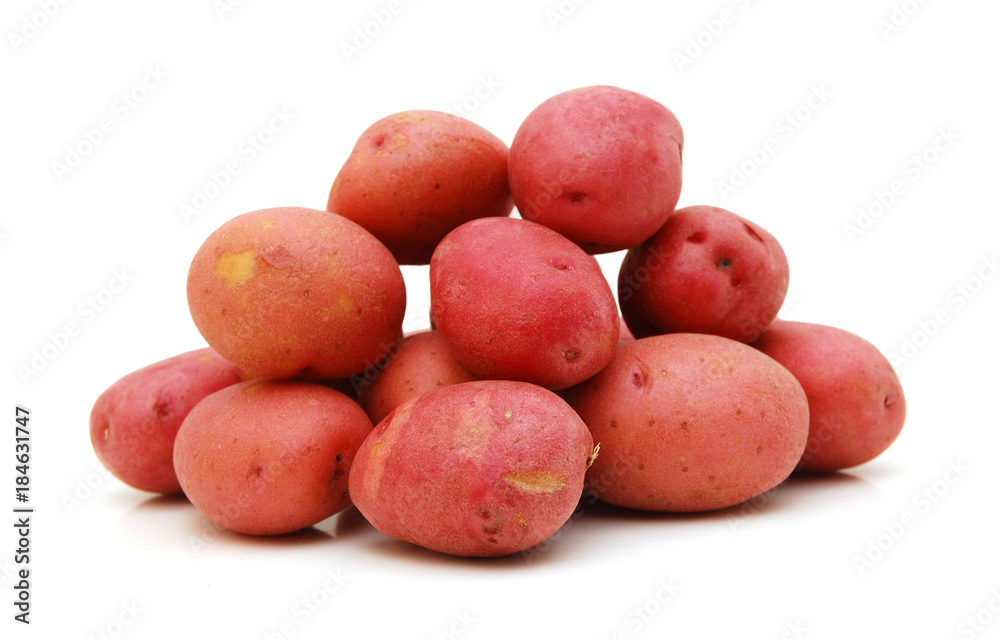 Heap of Perfect Raw Red Potatoes isolated on white background Heap of Perfect Raw Red Potatoes isolated on white background