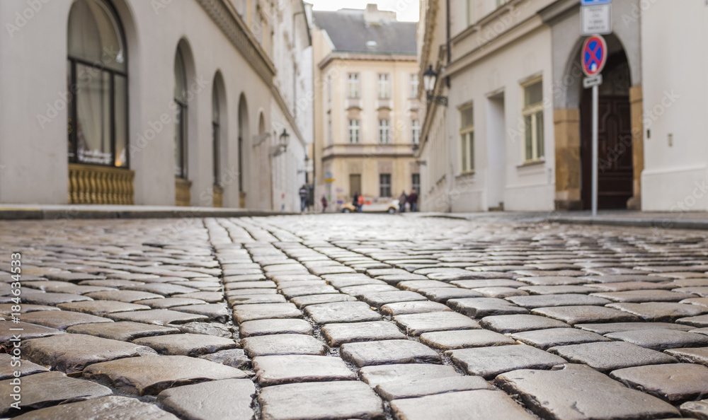 Old street in the historical centre of Prague. Cobblestones close-up.