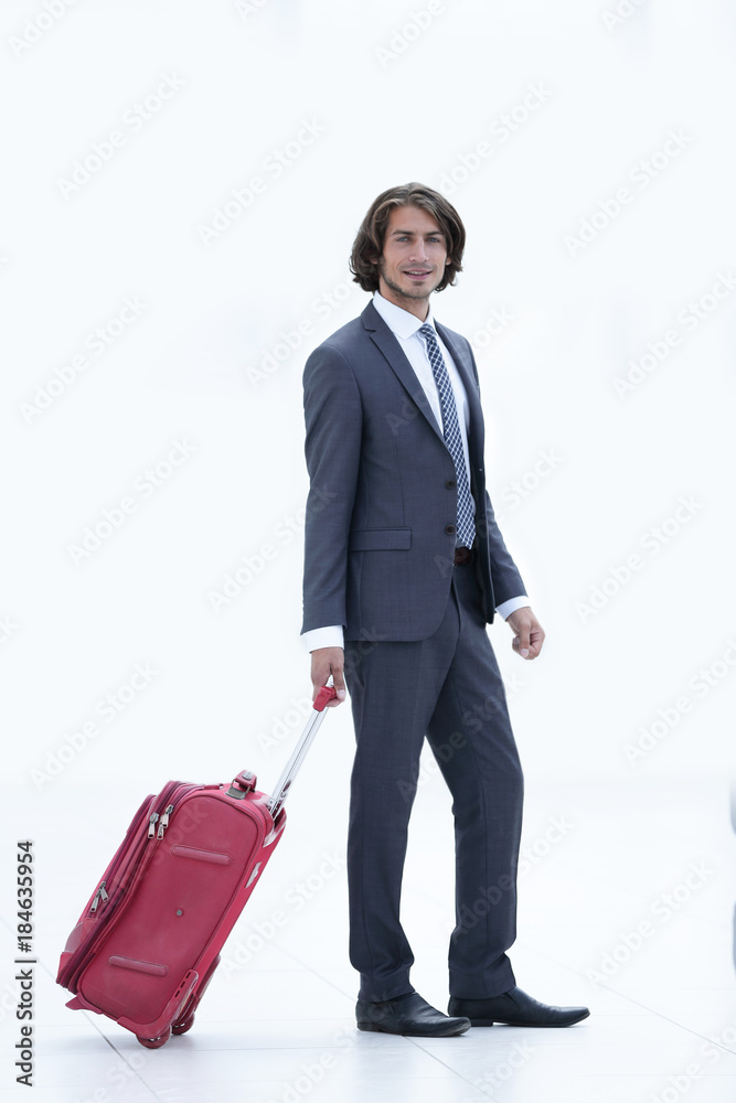 smiling businesswoman with travel suitcase smiling businesswoman with travel suitcase