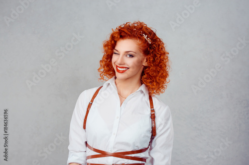 Slika na platnu Successful business woman winking