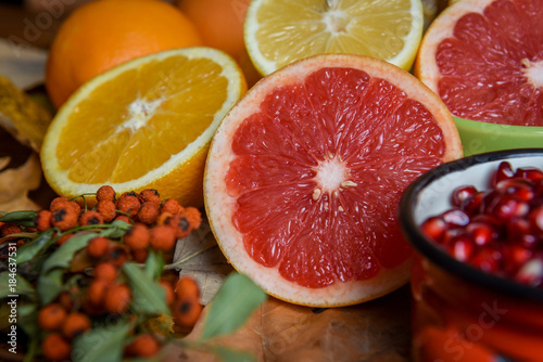 Tropical fruit mix of citrus  lemon  orange  pomegranate 