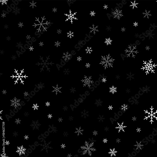 White snowflakes seamless pattern on black Christmas background. Chaotic scattered white snowflakes. Admirable Christmas creative pattern. Vector illustration.