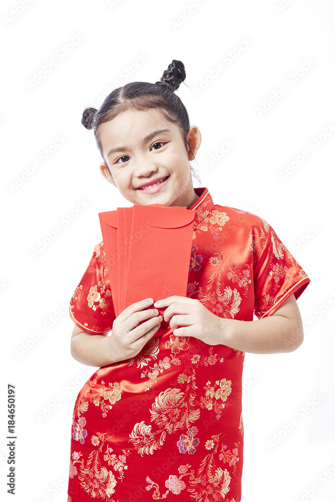 Happy Asian Chinese child receiving monetary gift or red paper packet Happy Asian Chinese child receiving monetary gift or red paper packet