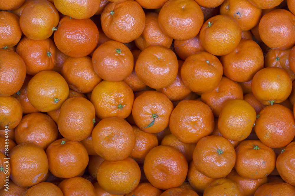 Fresh orange, tangerine fruit, mandarin background, high vitamin C good for health, top view