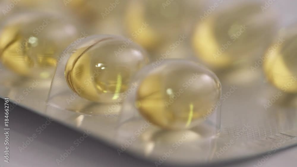 Pharmaceuticals and drugs, view of large number of gelatin capsules, amber color tablets in package, isolated.
Pharmaceuticals and drugs, view of large number of gelatin capsules, amber color tablets in package, isolated.