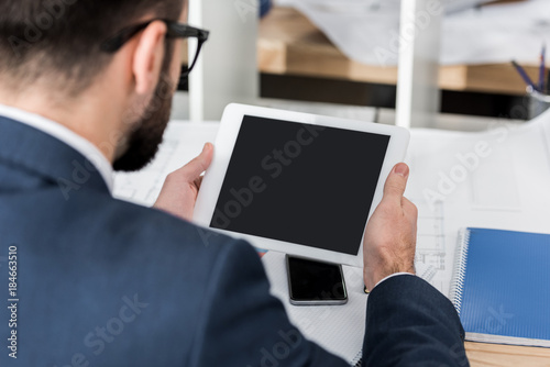 businessman using tablet at working place