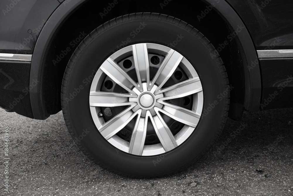 Modern car wheel, close-up photo