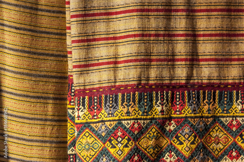 Cotton ancient  textiles  / Thailand folk textiles 
Traditional textiles made from natural pigments. a pattern of woven fabric that is unique to Thailand
