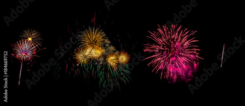Pack of 3 Fireworks Isolated on Black Background. Fireworks Light up the Sky, New Year Celebration.