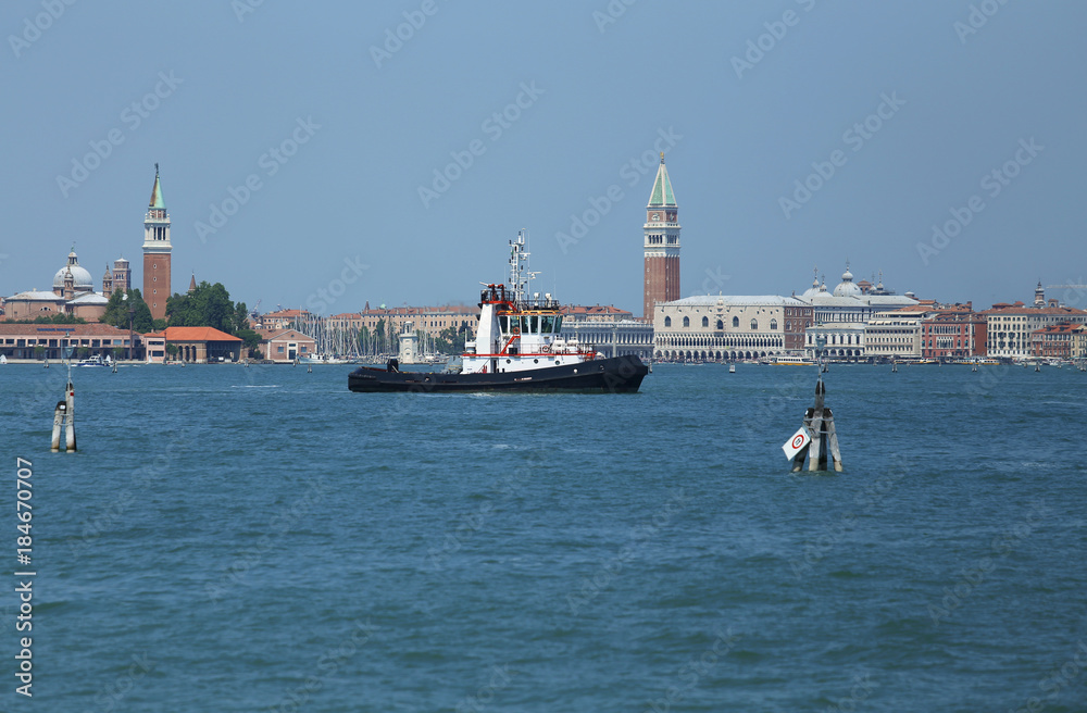 Powerful tugboat for cruise ships sailing to the port of Venice