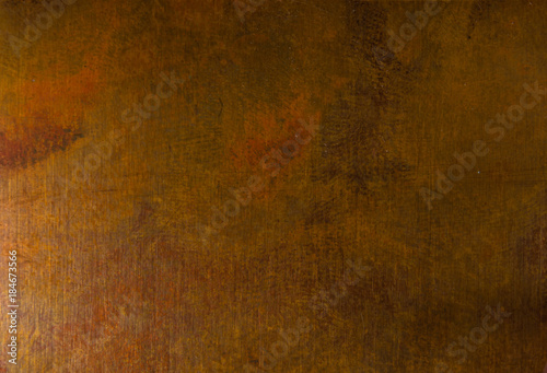 Aged copper plate texture, old worn metal background. © Wingedbull
