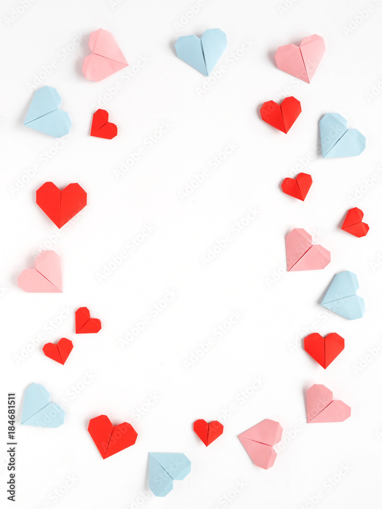 Pattern frame of paper origami hearts  isolated on a white background. Valentine's day background. 
