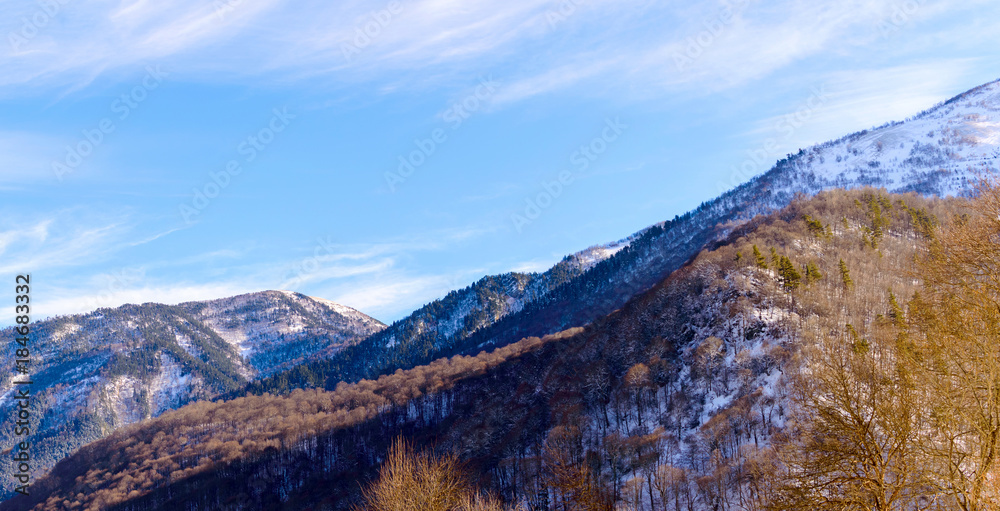 Winter mountain landscape with rocks and snow