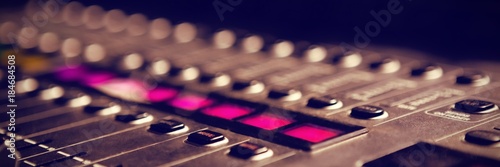 Close-up of sound mixer in studio