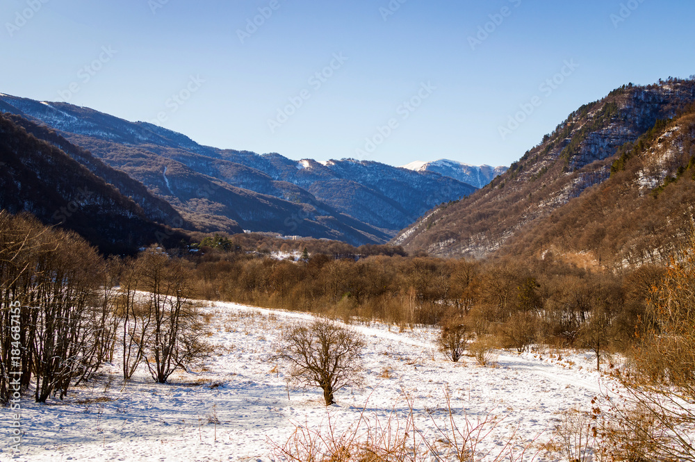 Winter mountain landscape with rocks and snow